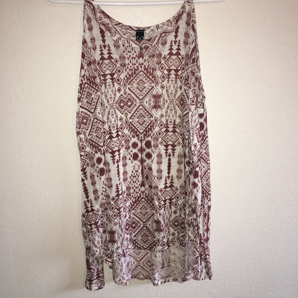 Orange and tan open shoulder shirt